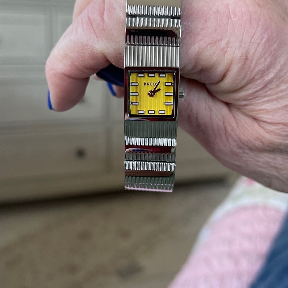 Stainless Steel Smartwatch with Yellow Dial